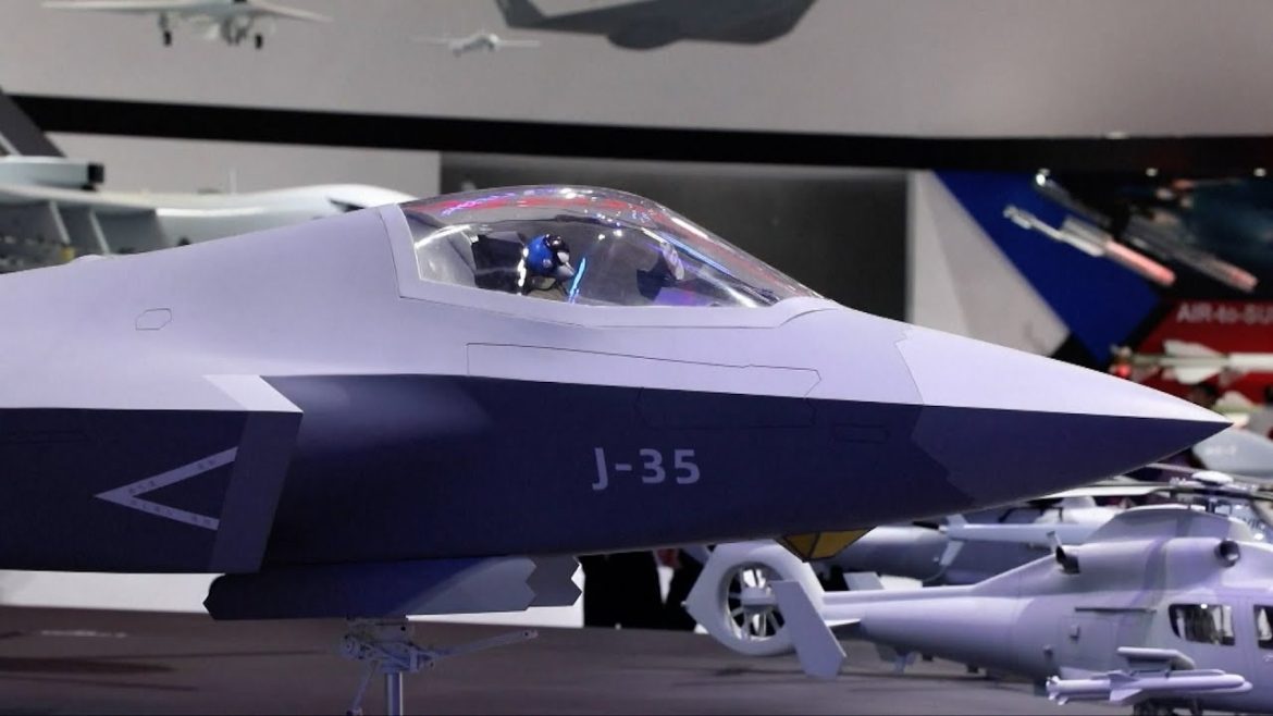 A close-up of a J-35 model jet featured at an aerospace exhibition, highlighting its sleek design and advanced cockpit.