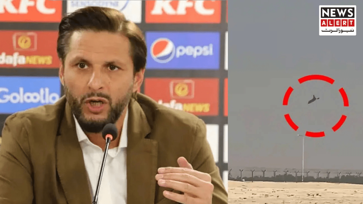 A press conference setting with a person speaking, alongside an image of a drone in the sky, highlighted in red for emphasis.