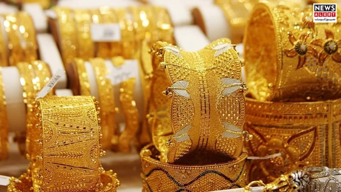 A display of intricate gold bangles and bracelets, showcasing various designs and textures, arranged elegantly on a retail counter.