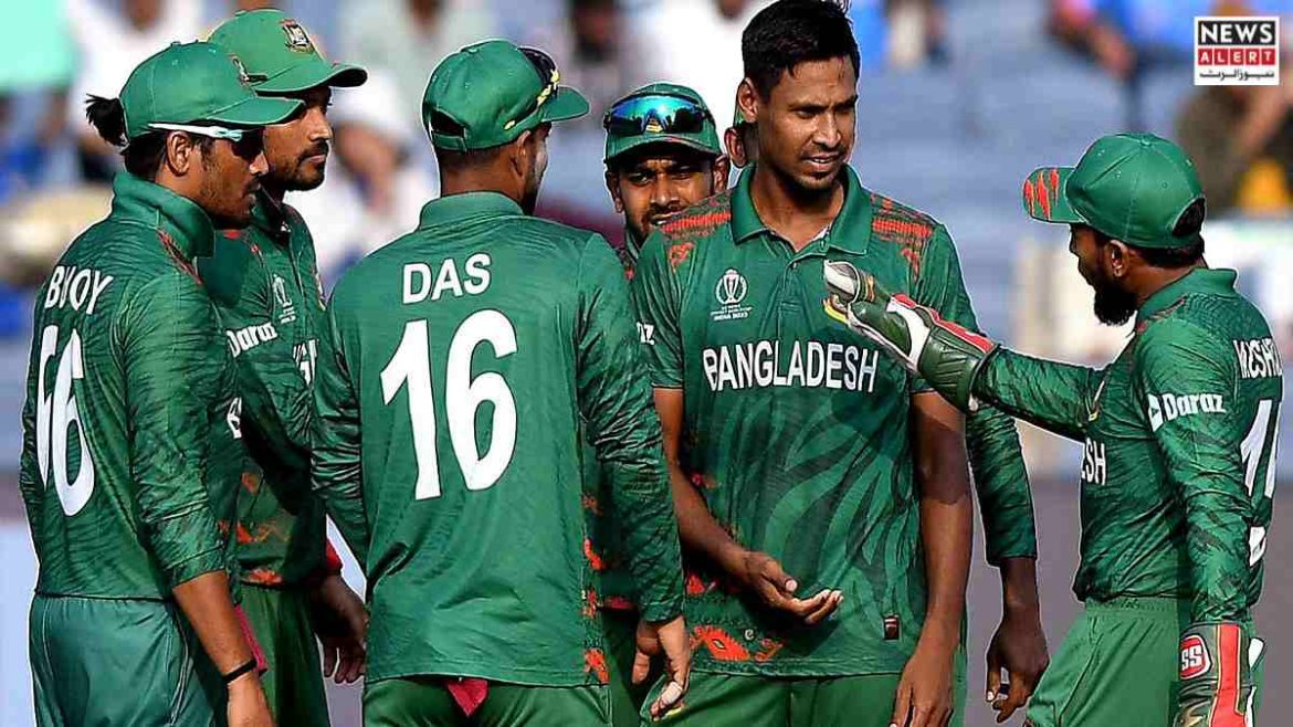 Bangladesh cricket team members in green jerseys engage in a discussion during a match, showcasing camaraderie and teamwork.