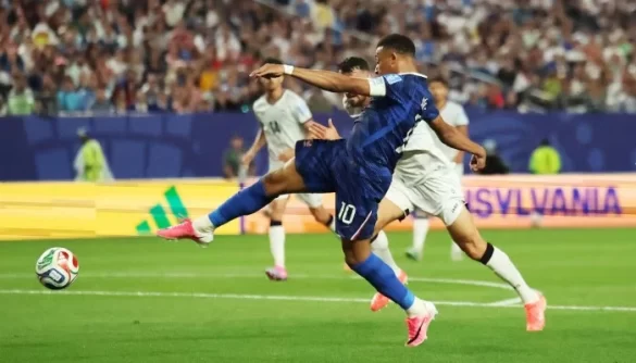 Mbappé Double Sends France into Knockout Stage After Weather-Disrupted Win
